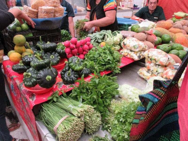 vegetable sellers inside the Lucas Galvez Market in Merida