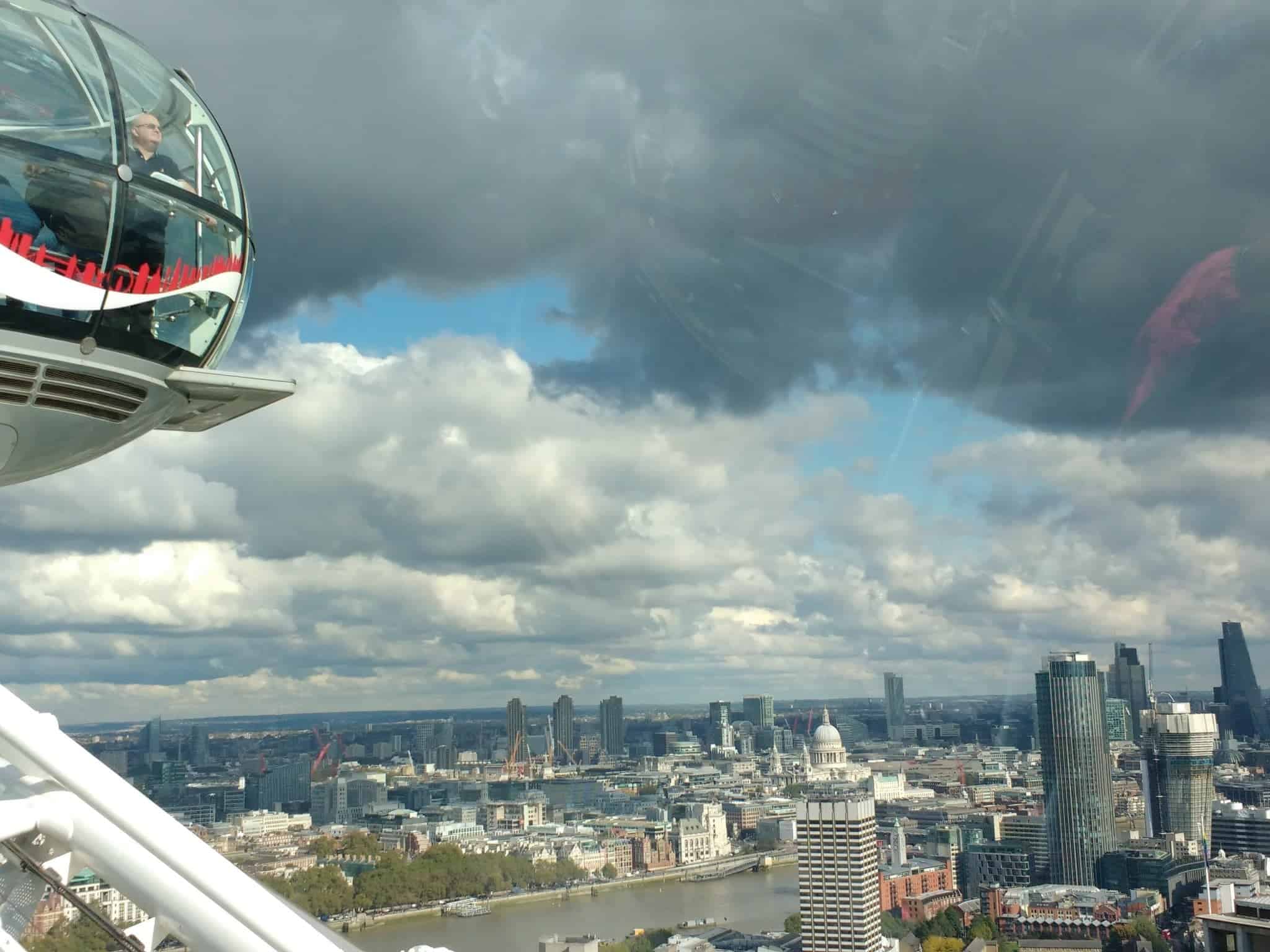 view of a capsule of the London Eye and the City beyond