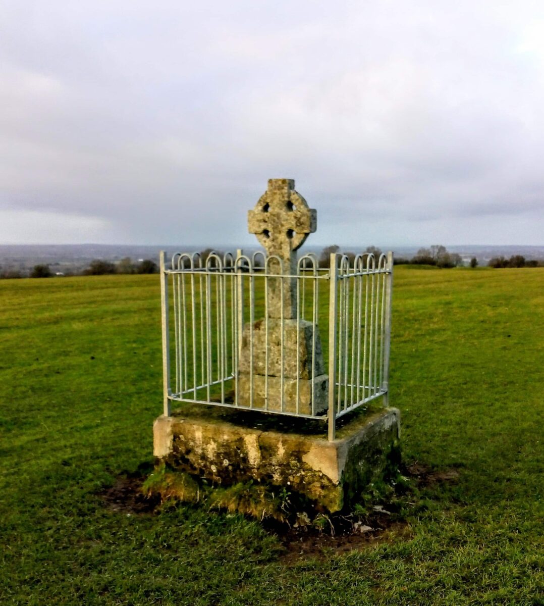Visitors to the Hill of Tara Ireland will spot this curious celtic cross surrounded by an iron fence. 