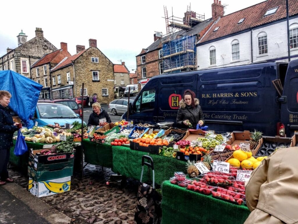 A street Market in Pickering Yorkshire the van shown is selling fruit and veg