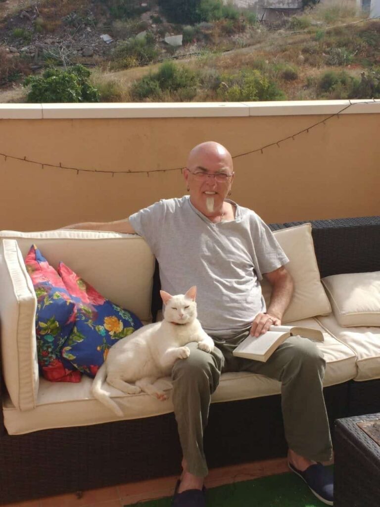 Alan and his friends the cats in Palomares Spain
