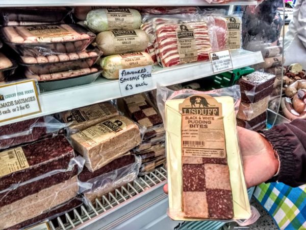 a package of black pudding served with a traditional English breakfast