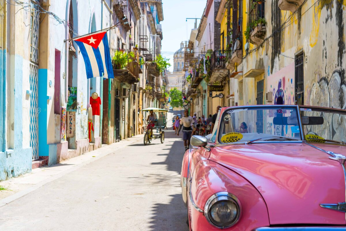 cars and an old Cuban street Cuban Food