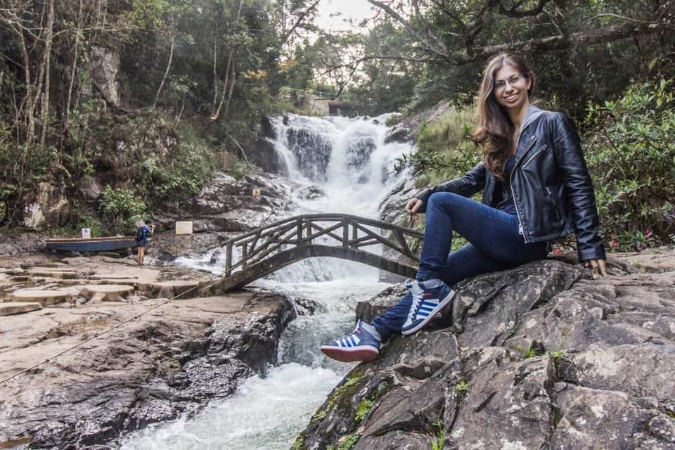 Barbara in Vietnam at a beautiful waterfall after a travel fuck up