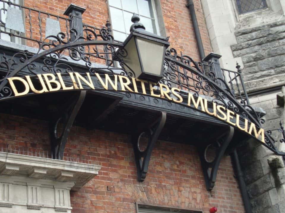 ornate Victorian ironwork scrolled sign that says Dublin Writers Museum