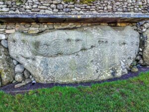 newgrange large stone block with carved symbols