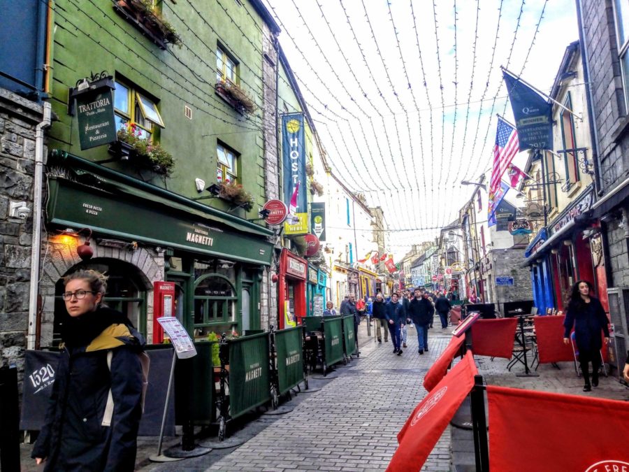 Galway city with shops bars and poeple