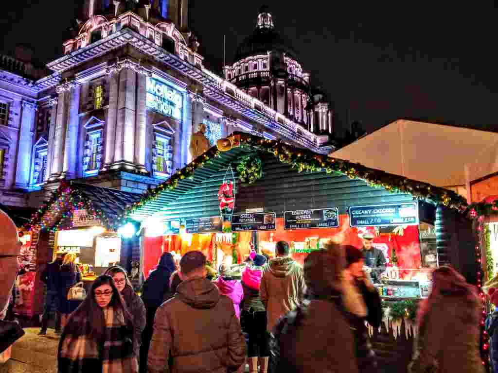 Belfast Christmas Market all lit up in the evening