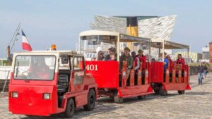 the Wee Titanic Tram is a small train that takes tourists around the Titanic quarter
