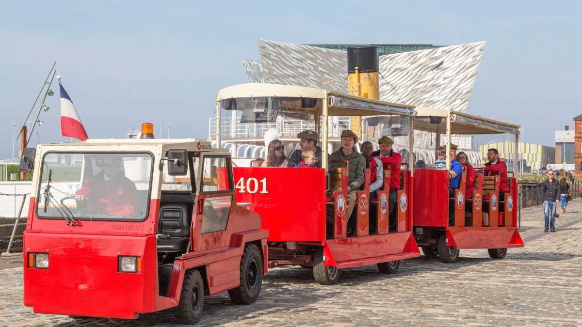the Wee Titanic Tram is a small train that takes tourists around the Titanic quarter