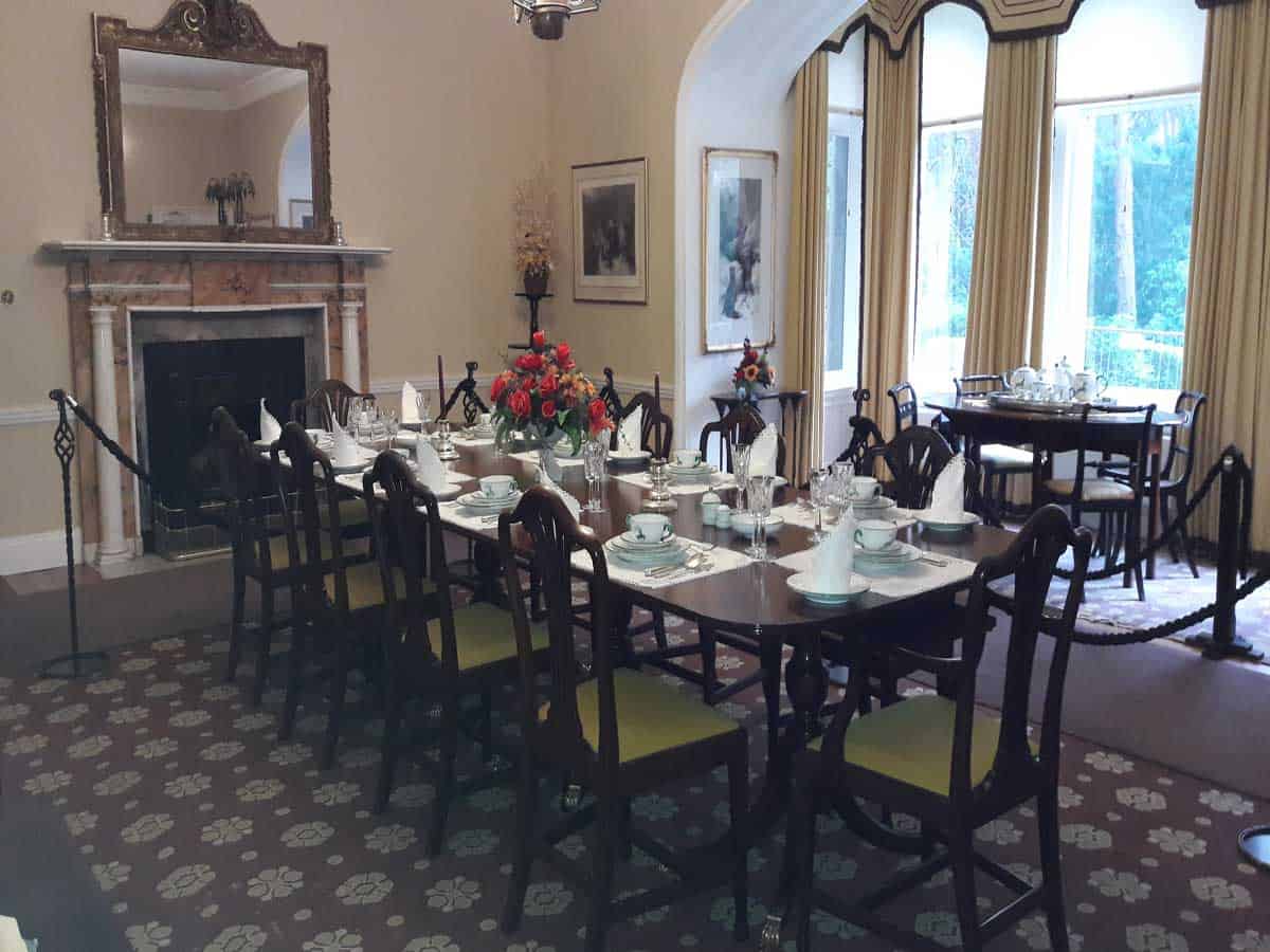 a large grand dining room at Glenveagh Castle set for dinner