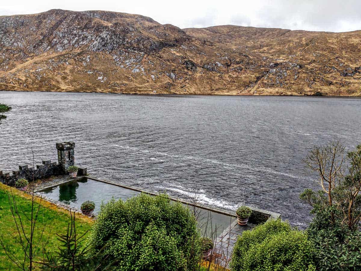 a view of Loch Veagh and the outdoor heated swimming pool at Glenveagh Castle that Marilyn Monroe swam in