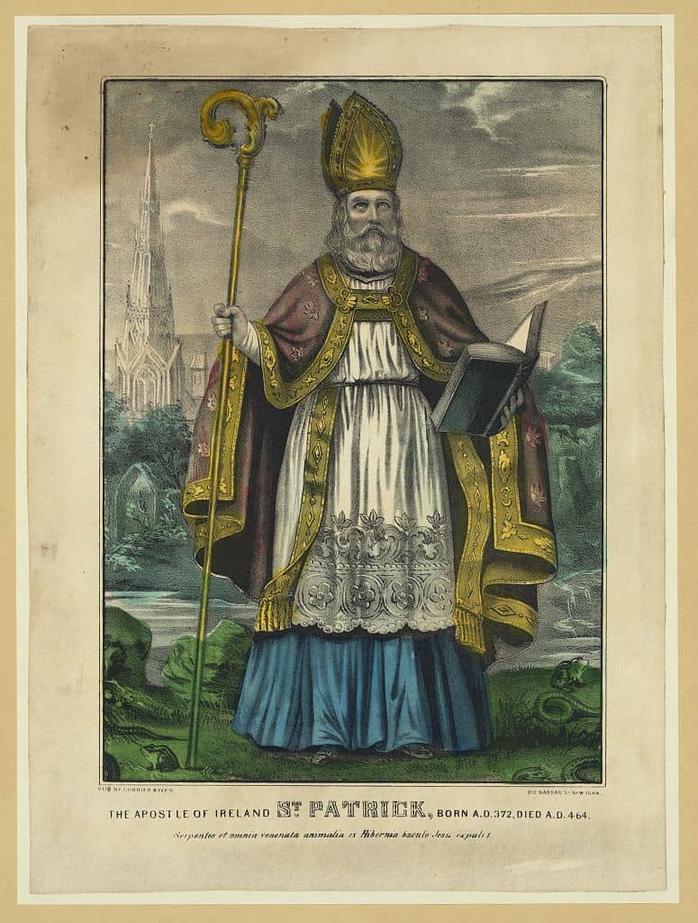 Ireland's famous saints - this is Saint Patrick with his peaked gold bishops cap and gold crozier with the image of his cathedral in Ireland. 