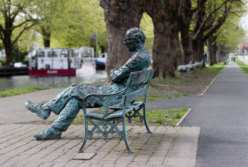 one of Dublin's many statues, man on a park bench