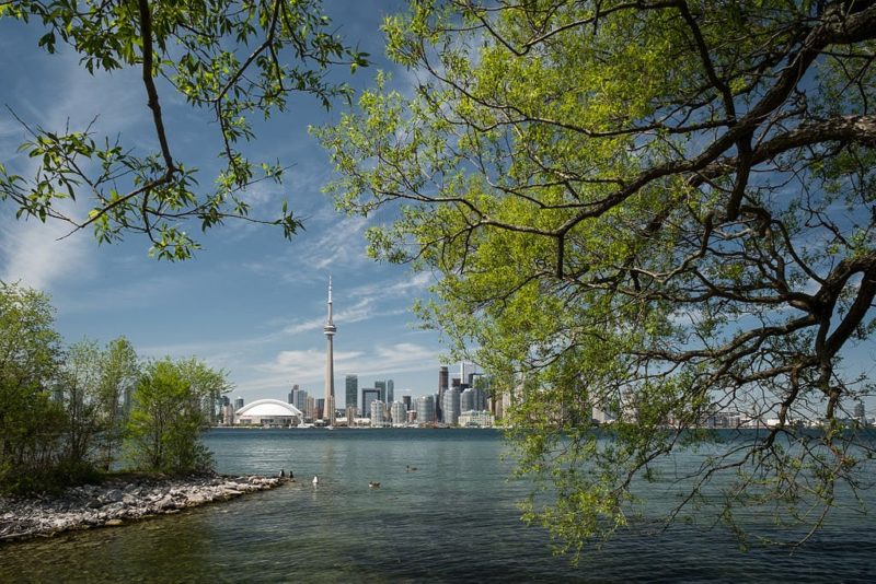 A view of the city of Toronto across the lake. Youc an see the CN tower and the Dome in the distance.