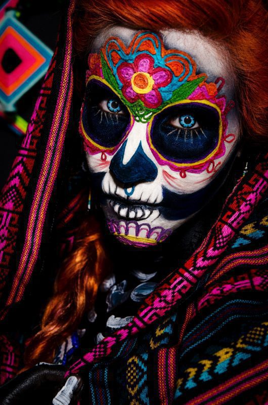 A catrina with a calavera painted face in Mexico