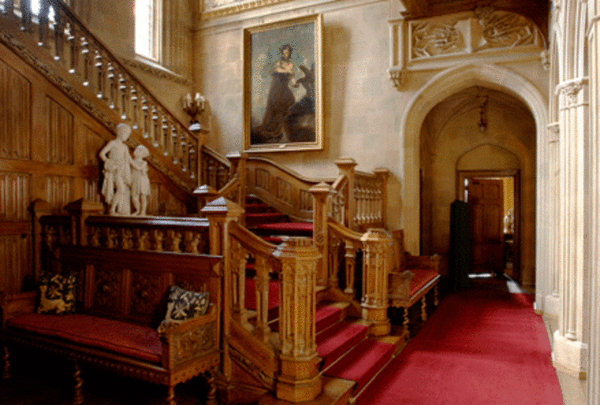 the beautiful carved oak staircase at Highclere Castle