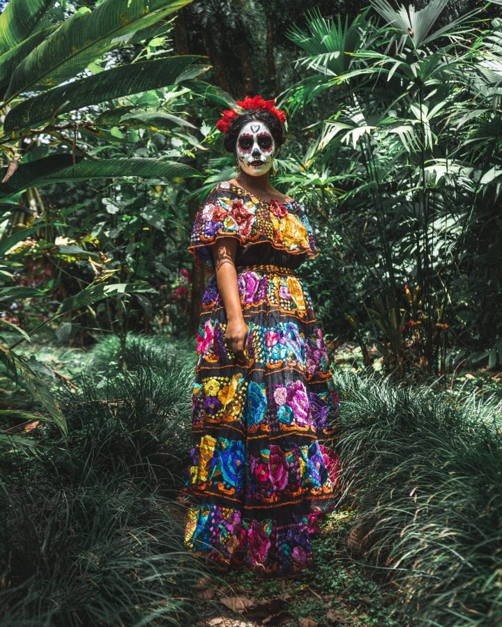 La Catrina in the woods of Mexico with a calavera painted face