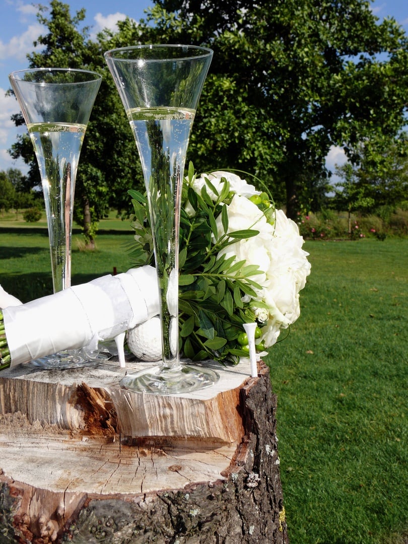 getting married in Ireland a ceremonial glass of champagne in an Armagh apple orchard