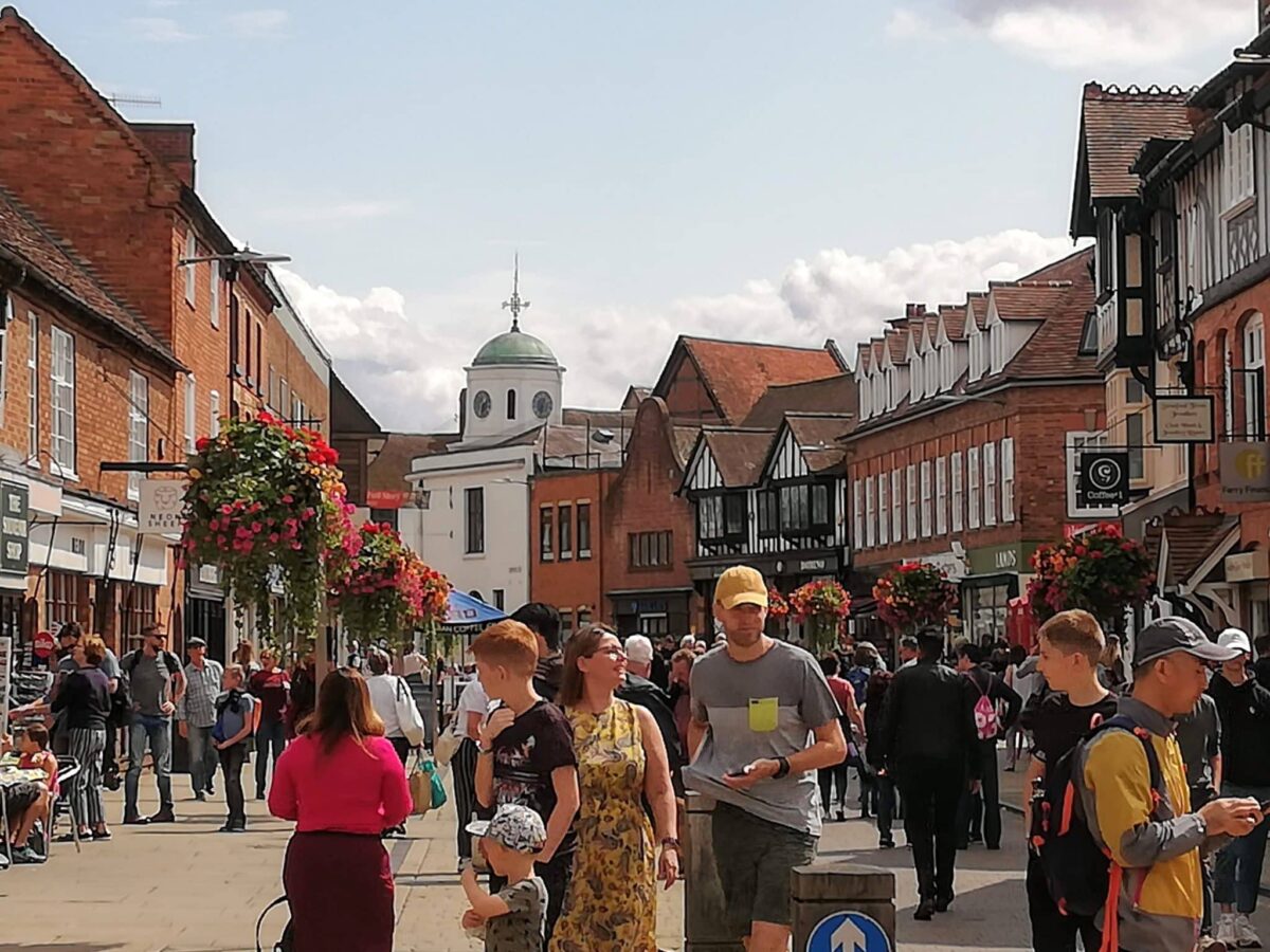 The main street of Stratford upon Avon, pedestrian only traffic among the half-timbered buildings. 