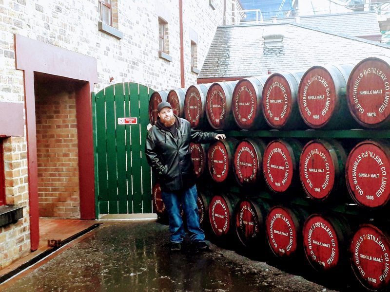 Hanging out at Bushmills Distillery in N. Ireland - whiskey casks outside the distillery