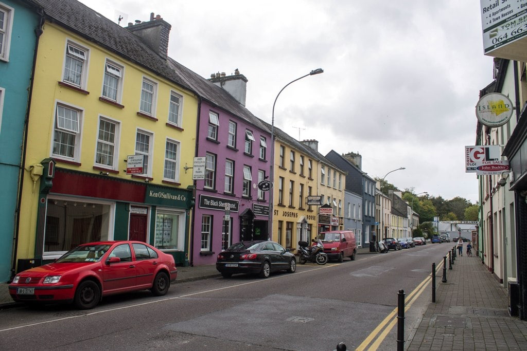 Killarney high street a row of colourful shops from pubs to boutiques