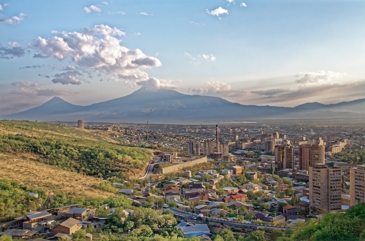 a view of Yerevan Armenia with the city and the mountains in the distance