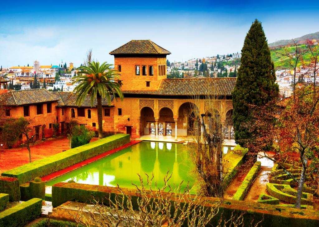Spain, Andalusia / Granada - March 17, 2018: Alhambra - ancient arabic fortress and architectural and park ensemble located on a hilly terrace in the eastern part of Granada in Southern Spain in Andalusia.
