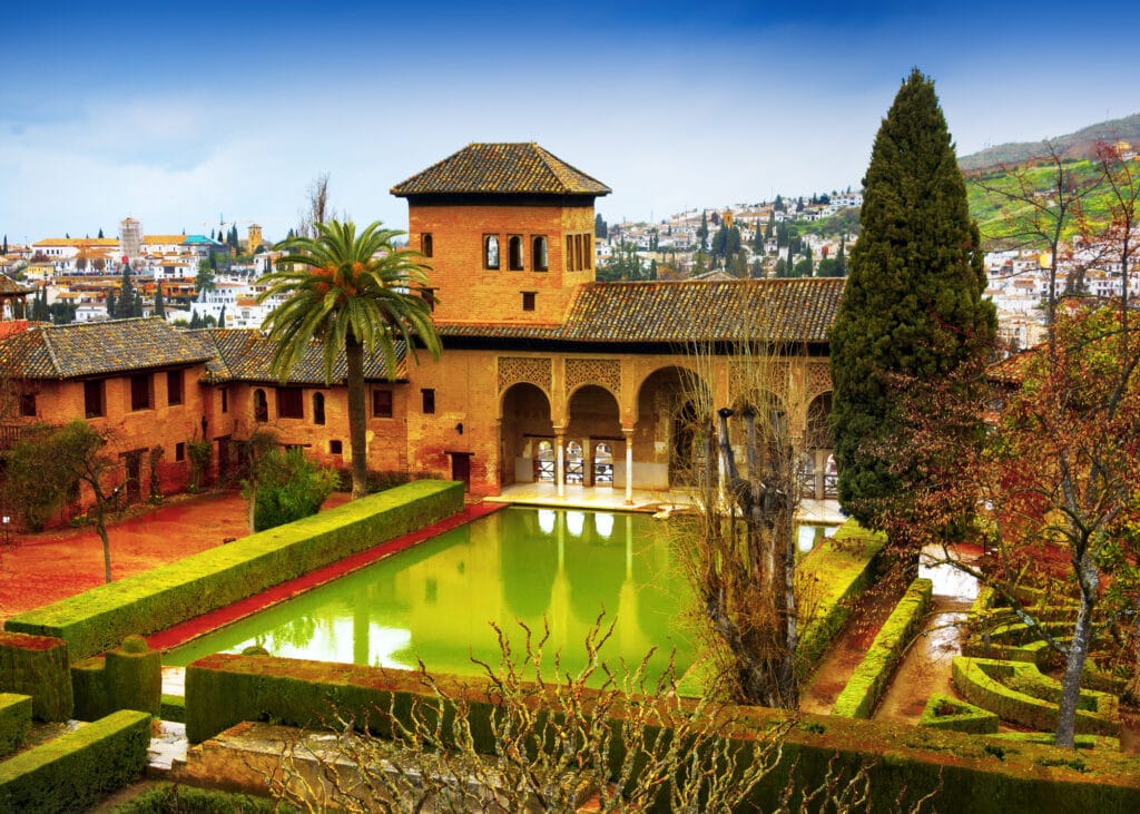 Spain, Andalusia / Granada - March 17, 2018: Alhambra - ancient arabic fortress and architectural and park ensemble located on a hilly terrace in the eastern part of Granada in Southern Spain in Andalusia.