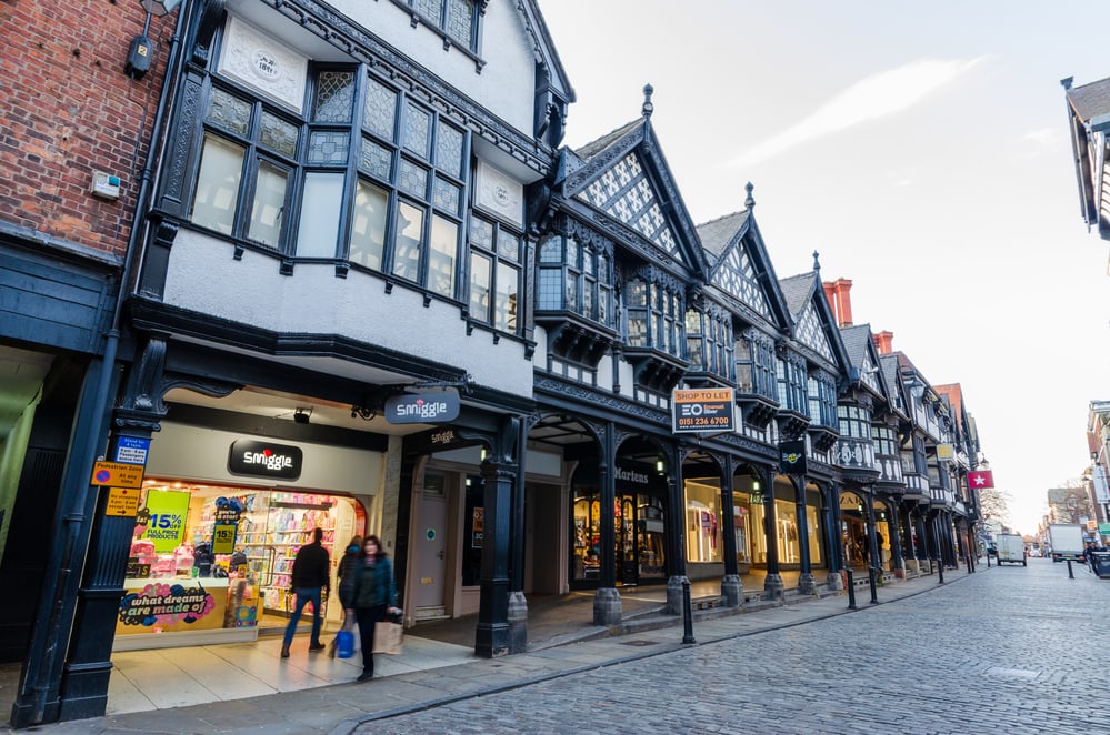 Chester, UK: Mar 1, 2020: A general street scene of Northgate Street at early evening with few shoppers.