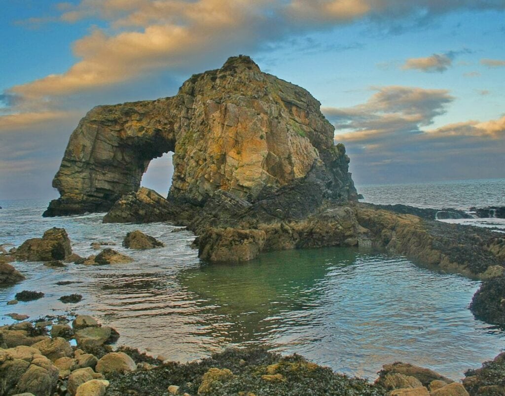 The Great Pollet Sea Arch, with dramatic skies at Fanad, Co. Donegal, Ireland