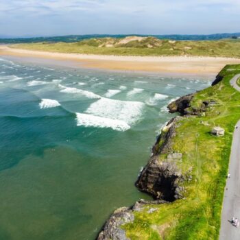 Spectacular Tullan Strand, one of Donegal's renowned surf beaches, framed by a scenic back drop provided by the Sligo-Leitrim Mountains. Wide flat sandy beach in County Donegal,