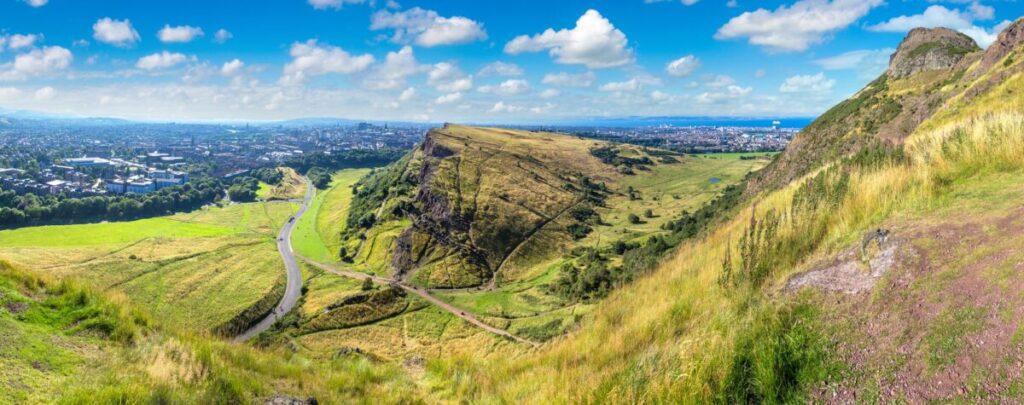 The stunning views of Edinburgh from Arthur's seat. Cityscape of Edinburgh from Arthur's Seat in a beautiful summer day, Scotland, United Kingdom