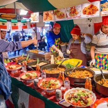 Food stalls in Brick Lane Sunday Market in London, United Kingdom