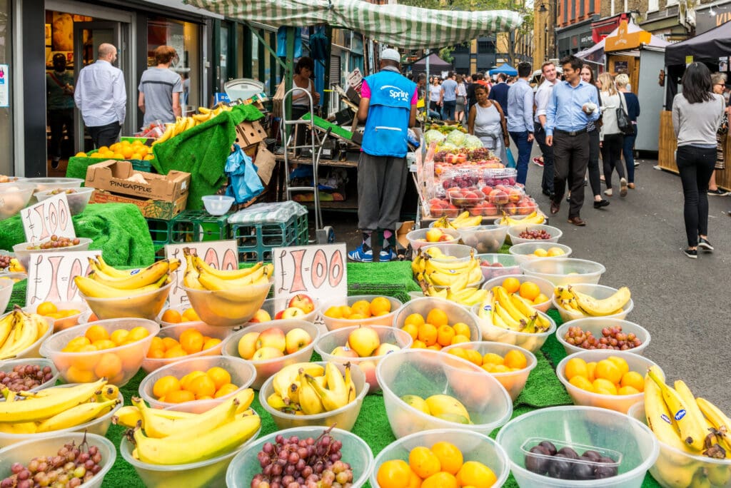 London in 2 days - London, United Kingdom - July 22, 2016: Leather Lane Street Market - street in Holborn with great streetfood, fruit and vegetables and clothes stalls, very popular with office workers Monday to Friday