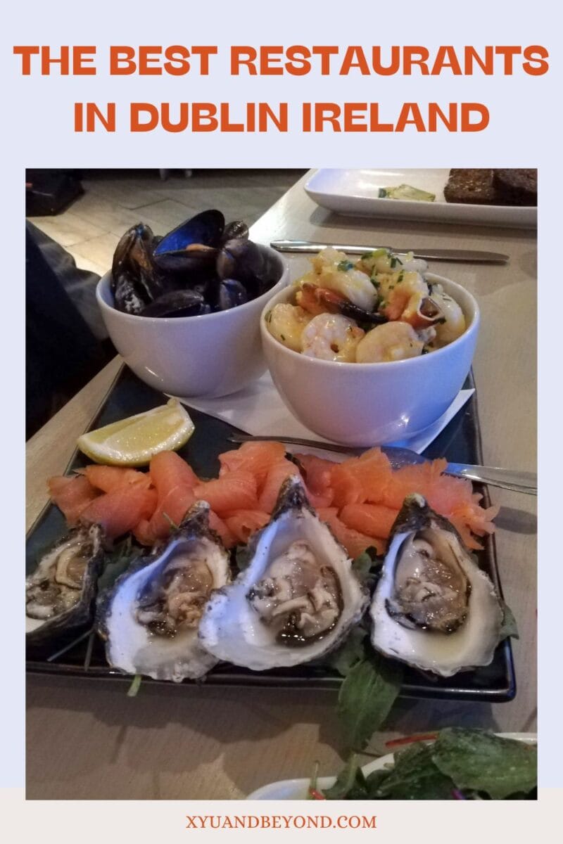 A promotional image featuring assorted seafood dishes, including oysters, shrimp, and mussels, at a restaurant noted as where to eat in Dublin, Ireland.