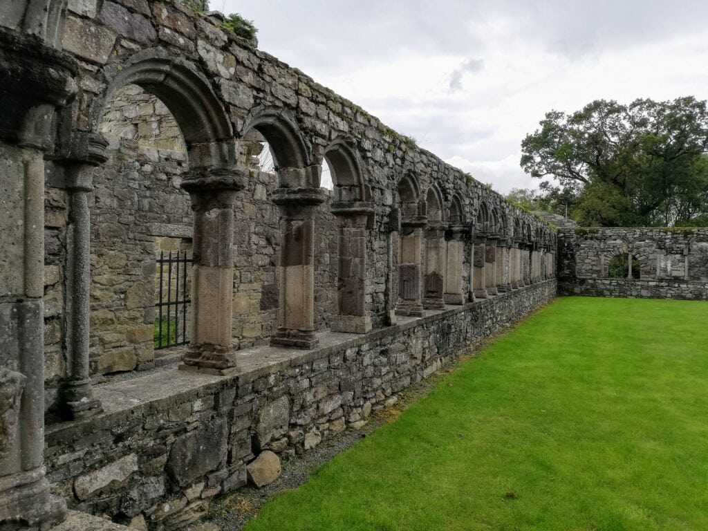 Jerpoint Abbey view of the cloister with its carved heads and small sculptures