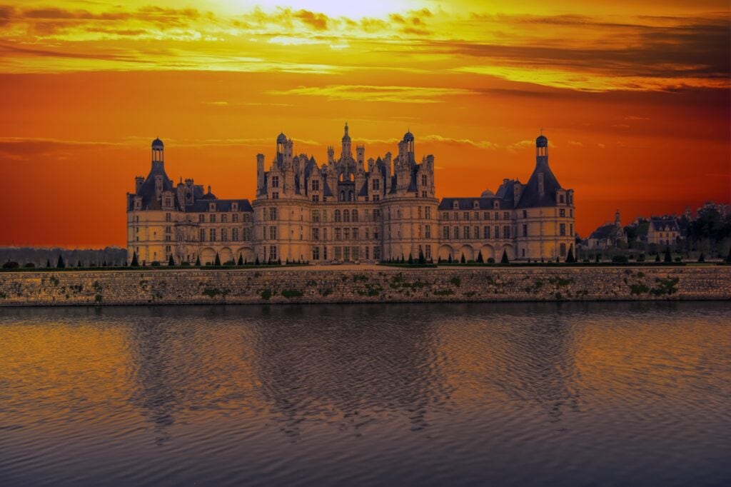 Loire, France - April 14, 2019: The castle of Chambord at sunset, Castle of the Loire, France. Chateau de Chambord, the largest castle in the Loire Valley. A UNESCO world heritage site in France