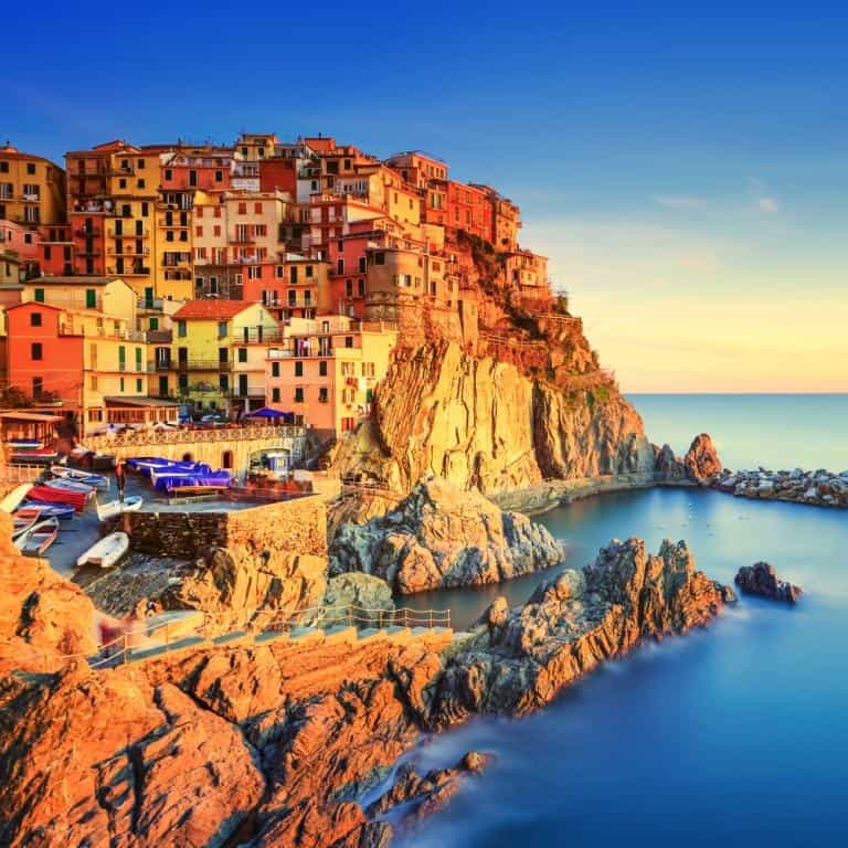 Manarola village on cliff rocks and sea at sunset., Seascape in Five lands, Cinque Terre National Park, Liguria Italy Europe. Square format. 