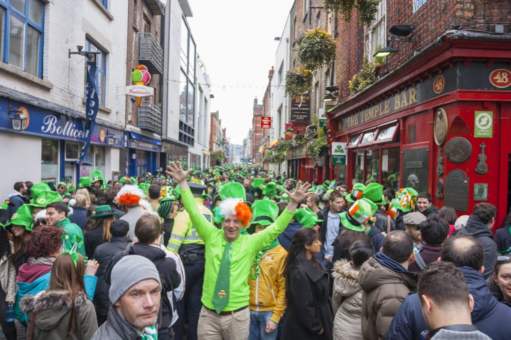 MARCH 17: Saint Patrick's Day parade in Dublin Ireland on March 17, 2014: People dress up Saint Patrick's at The Temple Bar