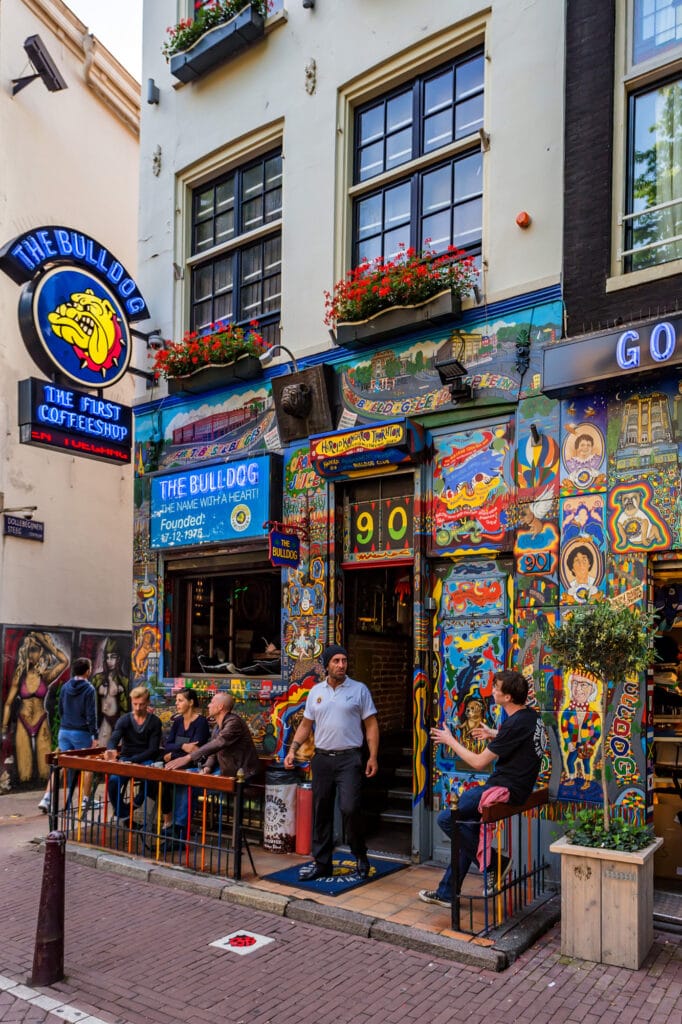 AMSTERDAM, THE NETHERLANDS - JUNE 10, 2014: Amsterdam Bulldog coffeeshop entrance where one can smoke weed. Cannabis in the Netherlands is illegal, but is decriminalised for personal use.