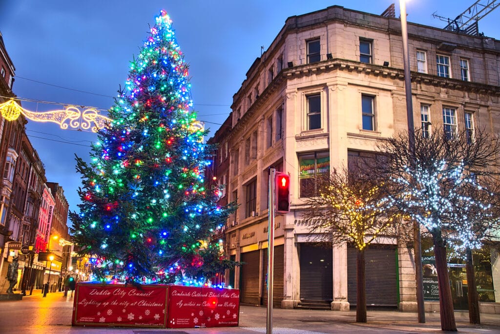 Christmas in Ireland a beautifully lit up and sparkling Xmas Tree outside in the town square