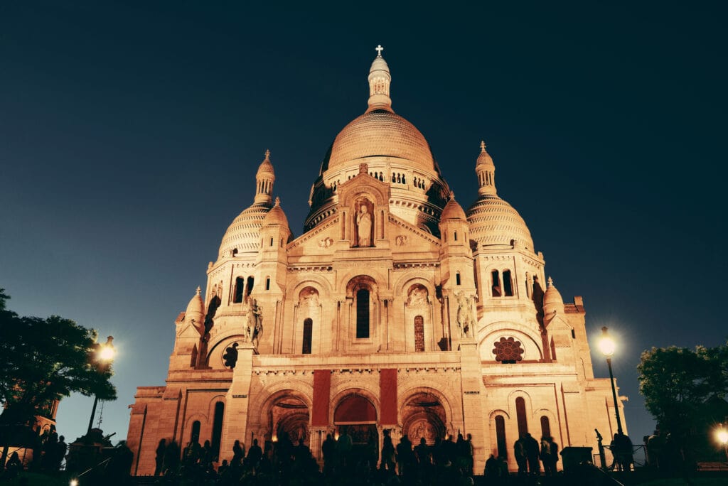 Sacre Coeur Cathedral at dusk in Paris, France.