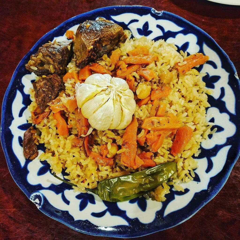 National dishes - Plov the national dish of Azerbaijan. Saffron rice with fried meat on top