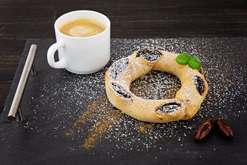 Traditional Maltese sweet honey rings made with black treacle, orange peel, cinnamon, spices and honey. Qaghaq tal-Ghasel traditional christmas dessert on Malta