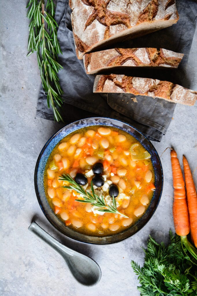 Fasolatha – delicious Greek white bean soup sprinkled with feta cheese
