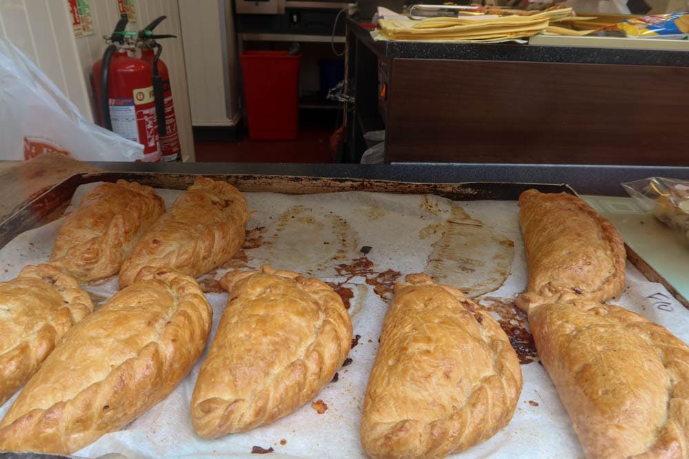 Fresh Cornish pasties in a bakery window in Fowey