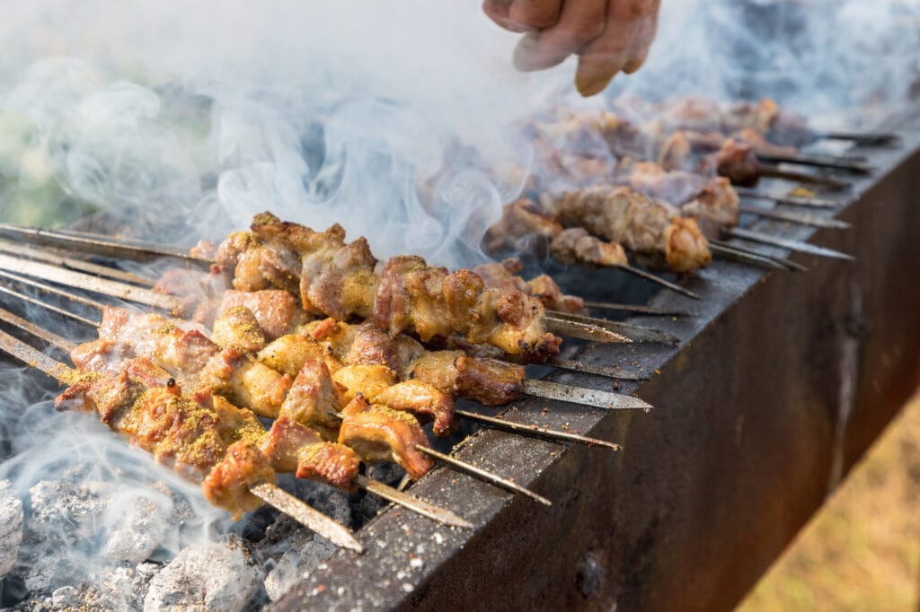 xinjiang roast lamb kebabs, sprinkle cumin powder