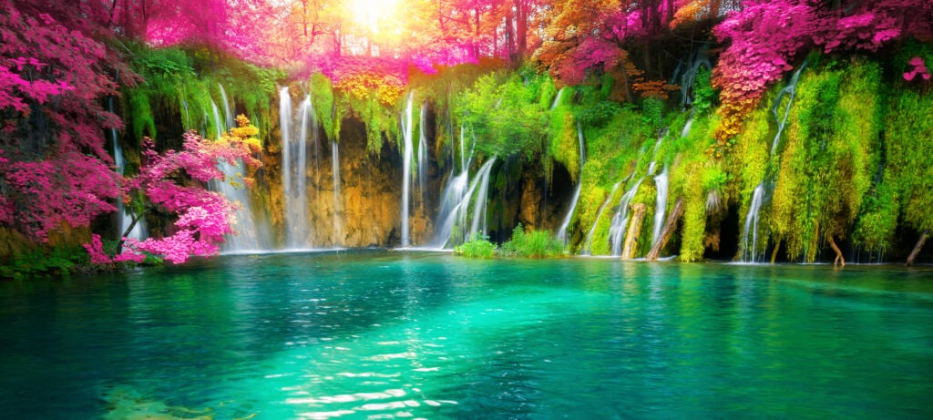 Exotic waterfall and lake landscape of Plitvice Lakes National Park, UNESCO natural world heritage and famous travel destination of Croatia. The lakes are located in central Croatia (Croatia proper).