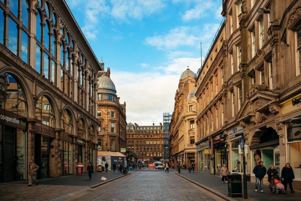 Glasgow Attractions one of Glasgow's main streets with Victorian Architecture and old sandstone buildings